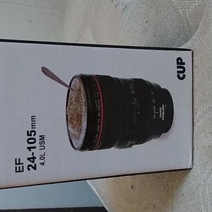 A cup but looks like a camera